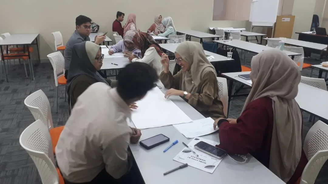 Participants collaborating during a workshop
